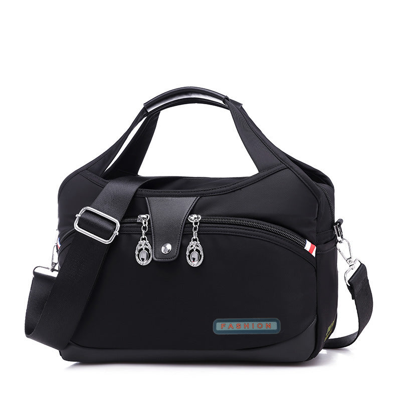 Fashion™ UUTUUS 2024! Trendikäs ja laadukas käsilaukku, jossa on useita säilytyslokeroita